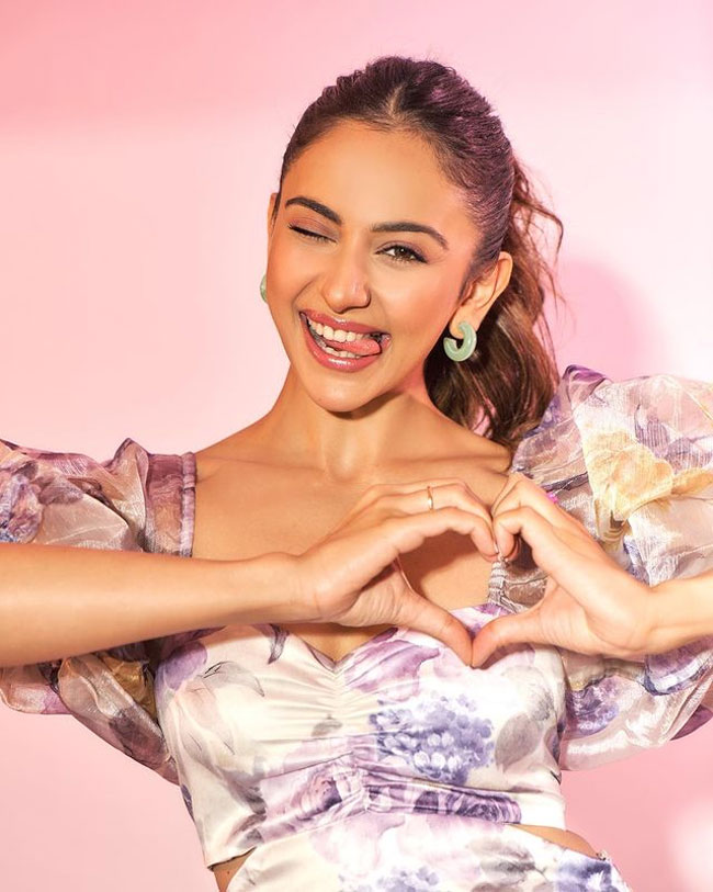 Funky Poses Of Rakul Preet Singh In Colorful Outfit